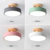cn-11134207-7r98o-lz8pg39z73c24e.webp Modern Nordic LED Ceiling Light with Wooden Design for Bedroom Study Balcony